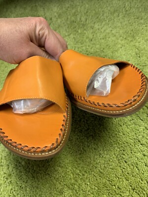 Nurture Women 9.5 M Leather Chain Stitch Orange Slip On