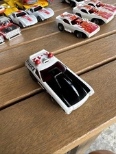 Aurora AFX Police Vega - White Black A-12 Slot Car - Screecher Chassis - NOS