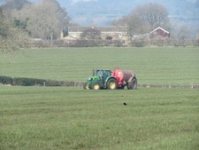 Photo A3 Fertilising the fields Burnt Yates Spreading slurry on a pastur c2022