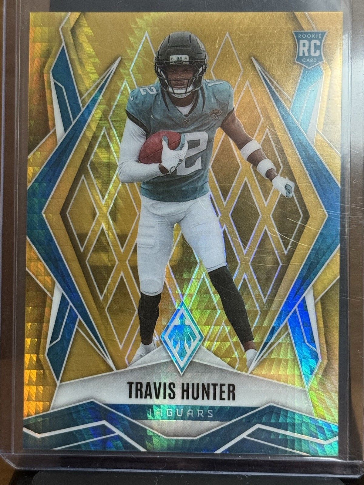 2025 Panini Phoenix Travis Hunter #157 Jaguars Gold Rookie /10