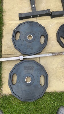 20kg olympic barbell , 140kg weight plates and 2 piece squat rack