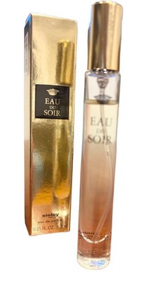 Sisley Paris Eau du Soir travel spray, featuring a 6.5 ml (0.21 fl oz) bottle
