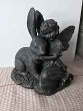 Garden Fairy Sitting with a Rabbit Garden Statue Ornament.