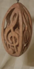 Musical gift. G clef carving using scroll saw from a single piece of wood