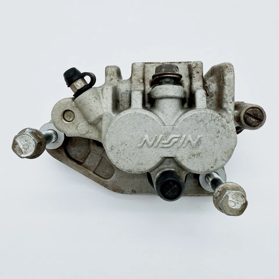 Pinza de freno delantera con pastillas Suzuki RM 125 250 1996-2000 OEM Foto 2 de 4