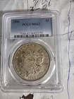 1886 P Morgan Silver Dollar $1, MS 63 PCGS, face toned