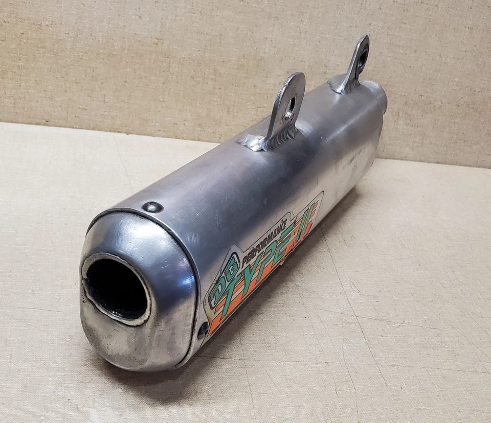 SILENCIADOR ESCAPE SILENCIADOR OVALADO DG PERFORMANCE TIPO II KAWASAKI KX250 1986 FUNCIONA Foto 3 de 4