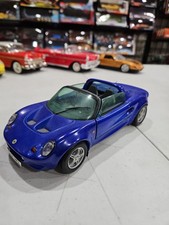 1/18    1997  LOTUS ELISE ,  IN  BLUE ,   BY CHRONO,   NO BOX - MISSING MIRRORS