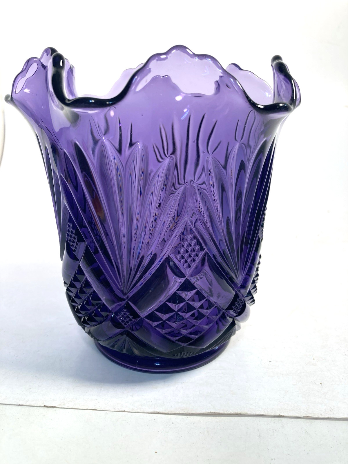 Bud vase, irradiated, embossed and debossed