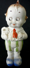 Antique German Bisque Kewpie Googly Eyed Boy With A Flower Doll Figurine