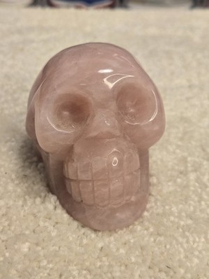Polished pink quartz sculpted skull 2''x3'' 