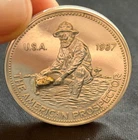 1987 Engelhard American Prospector  1 oz silver round with gold nugget in pan
