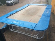 trampoline, 3 metres x 5 metres proffesional quality portable with wheels