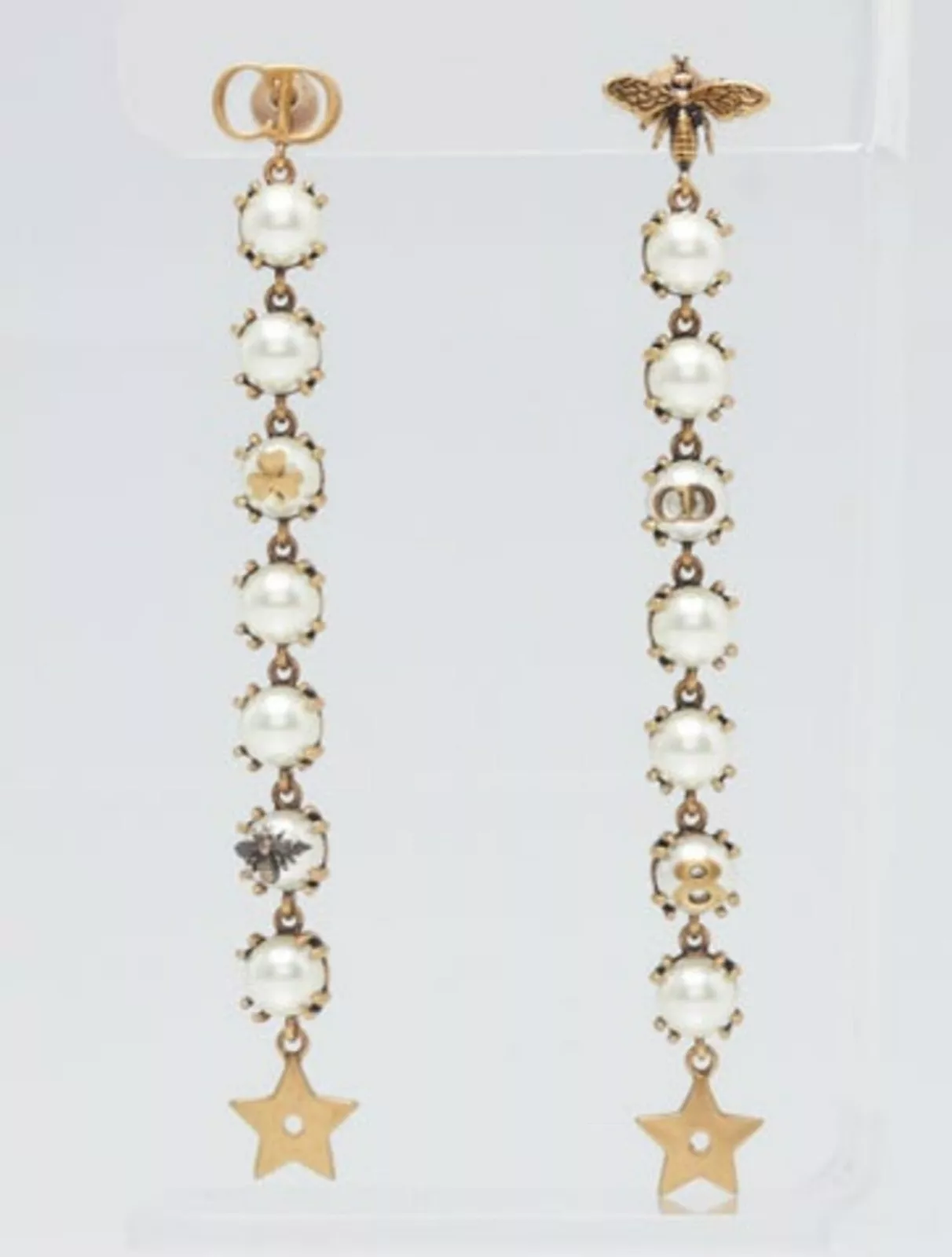 Boucles d'oreilles Christian Dior métal doré et perle étoile goutte métal