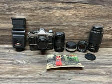 Canon AE-1 Program Camera Bundle Winder 4 FD Lenses 75-200 50mm Flash Manual