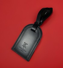 Louis Vuitton Paris targhetta nome con K timbrata tono argento metallo nero grande LN