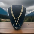 Vintage extra large black heart costume jewelry necklace