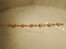 9kt gold bracelet. 9.86g 7.2 inches. hallmark 