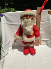 Antique Steiff Santa Claus 731 from 1953 in his original suit with all tags.