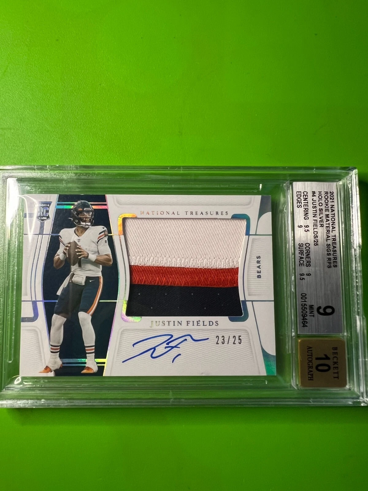 Justin Fields Panini National Treasures Rookie Material Signatures #JF Holo Silver
