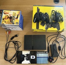 Sony PlayStation 2 Slim Black. Games, Memory Card, Controllers Included.