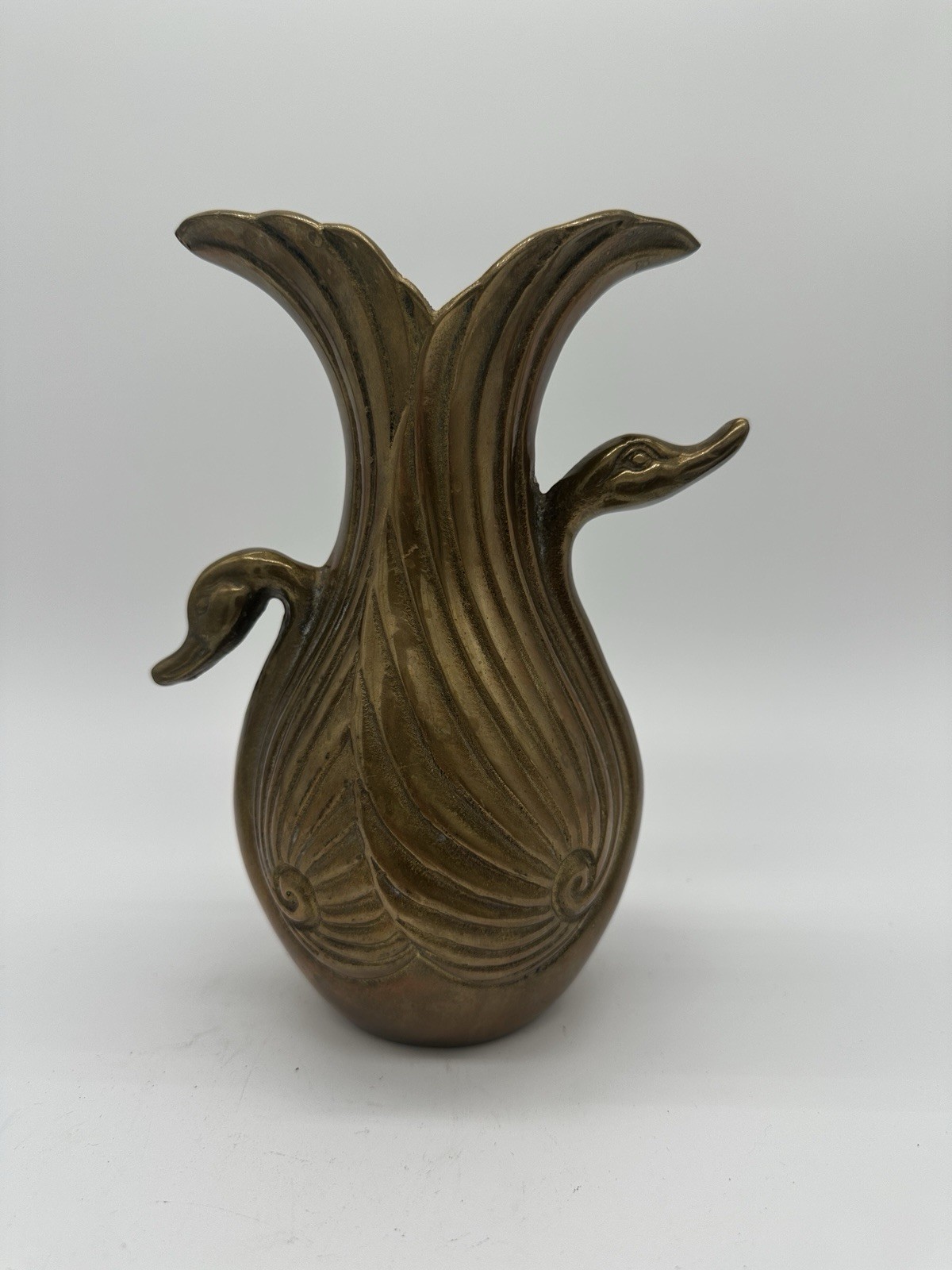 Solid brass Art Deco sculpture vase with double swan design and patina