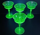 4 VTG Uranium Vaseline Depression Glass Paneled Footed Glasses 5 1/2" tall.