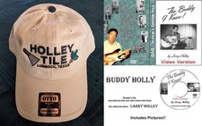 Buddy Holly "Holley Tile" Cap and Buddy DVD of Buddy's history, from his family. Buddy Holly "Holley Tile" Cap and Buddy DVD of Buddy's history, from his family.