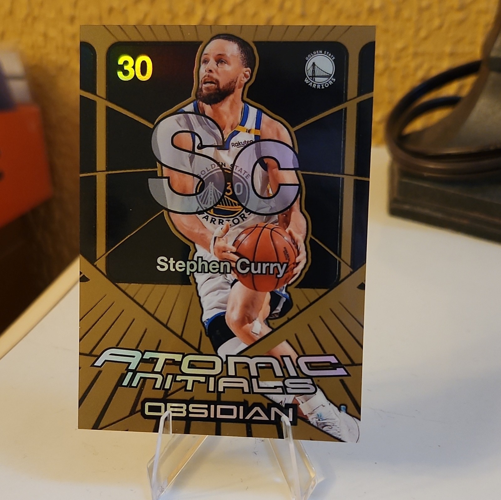 Panini Obsidian 2024-25 Atomic Initials Stephen Curry #11 Bronze Flood /60