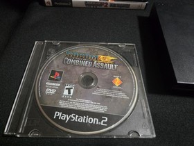 PS2 Slim Console, 2 Controllers, 11 Games, & Cords . Must See!