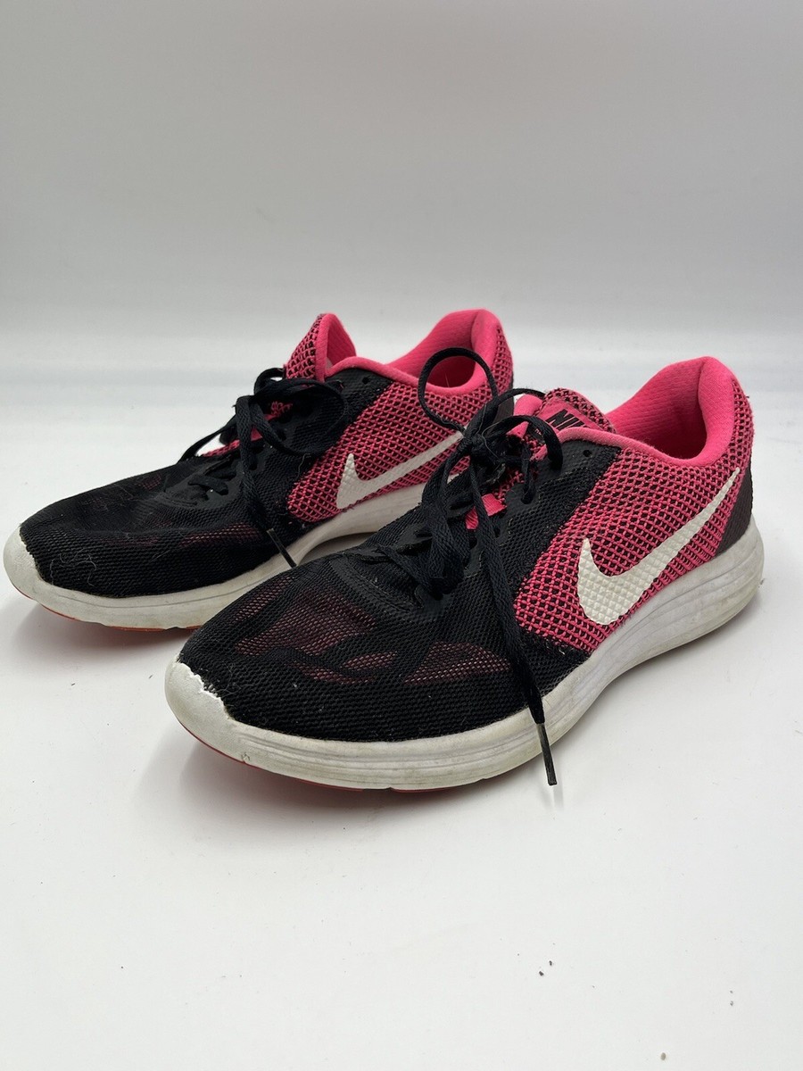 pink nike revolution