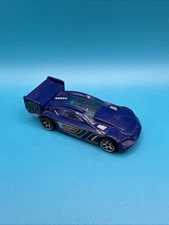 2012 HOT WHEELS TIME TRACKER #914 BLUE 3" DIECAST RACE CAR W/ SILVER & YELLOW