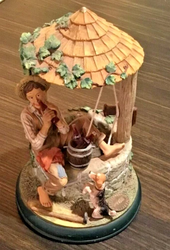 COCA COLA 'NORMAN ROCKWELL' 'BOY RESTING AT THE WELL' FIGUREINE - VINTAGE