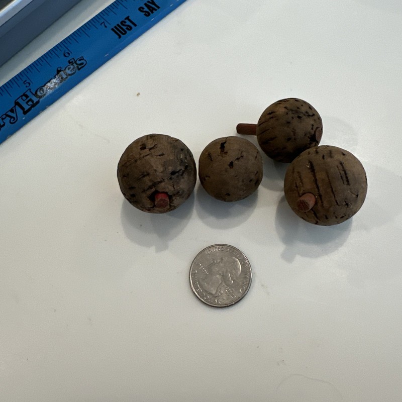 Four vintage cork fishing bobbers floats