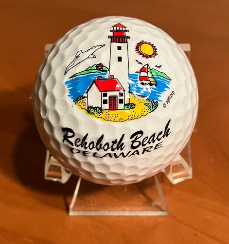 Two (2) Rehoboth Beach Delaware Lighthouse & Dolphins Logo Golf Balls - Picture 2 of 3