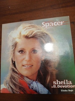 SHEILA E B. DEVOTION- SPACER
