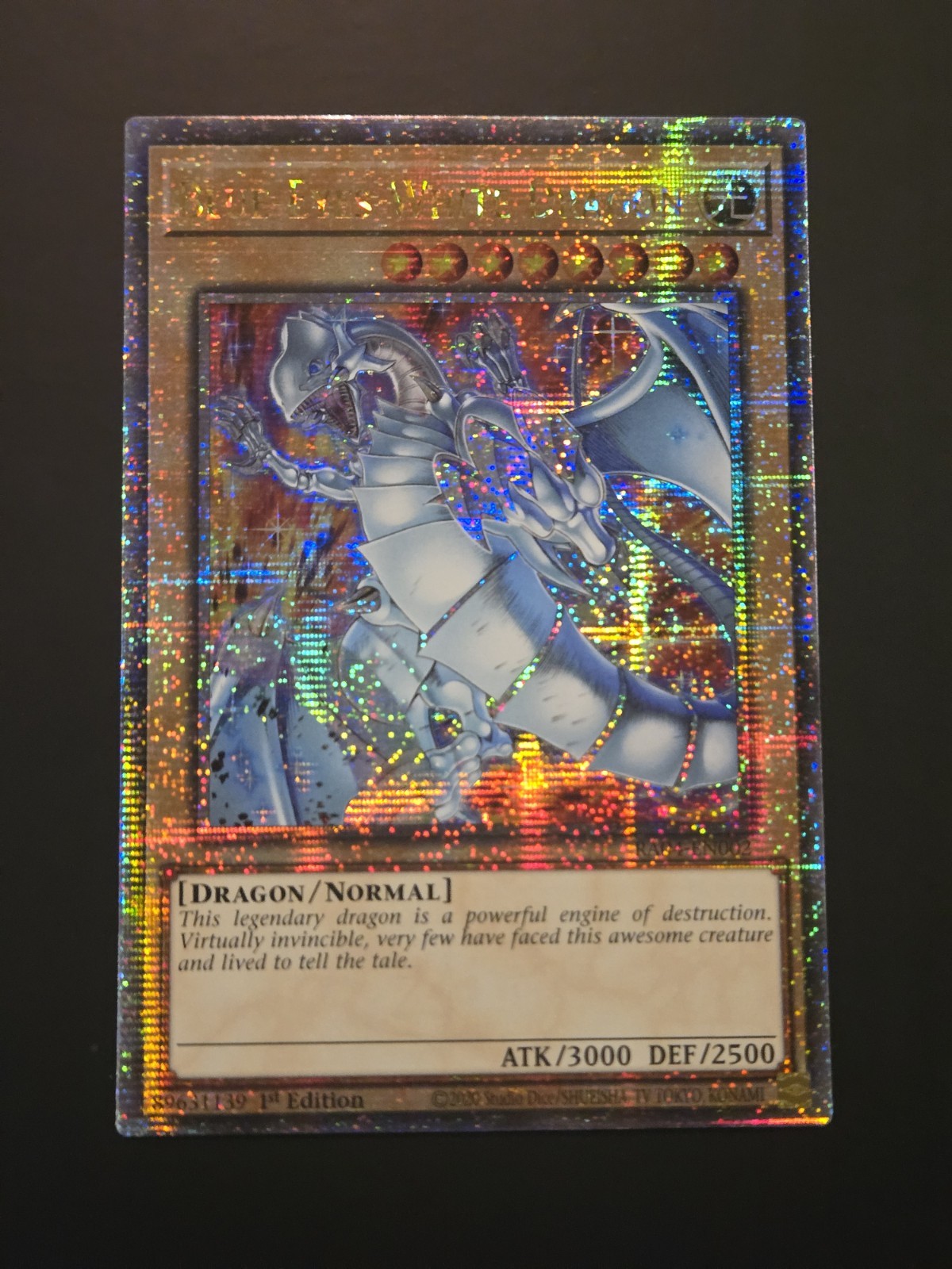 Blue-Eyes White Dragon (New Art) (Quarter Century Secret Rare) RA04-EN002...