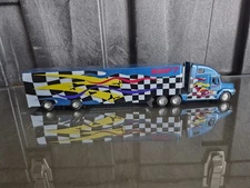 Pem Tonkin 1/64 Volvo Semi Tractor And Racing Trailer. Swift Blue With Race Flag