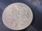 1880-O MORGAN SILVER DOLLAR IN AU MINT STATE CONDITION