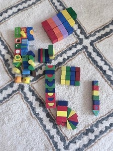 A lot of gently used colored wood different shaped blocks