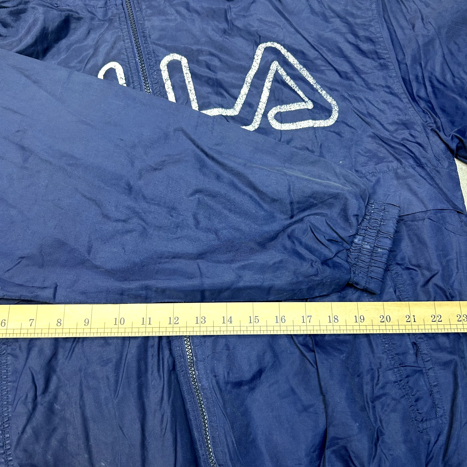 Giacca a vento Fila Track uomo media vintage full zip foderata in rete blu navy