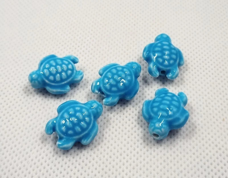 5pz perline ceramica tartaruga 19x15mm colore azzurro bijoux