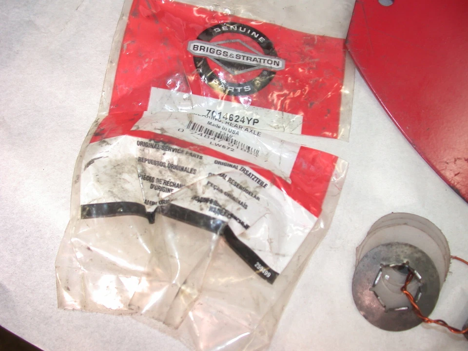 Motor trasero pargo piloto.  7037958, guardabarros izquierdo nuevo, cojinete, maletero, precinto. HD. Foto 3 de 4