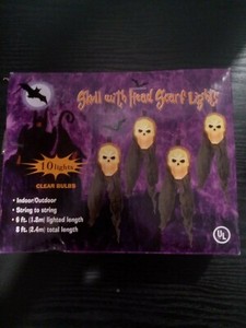 Halloween skull with head scarf lights 10 lights clear bulbs indoor outdoor bran