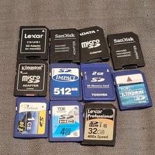11 pieces total: 7 actual SD/SDHC memory cards + 4 empty microSD-to-SD adapters.