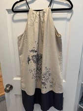 Womens Loft Dress size 6. Beige with black floral pattern, tiny polka dot hem.