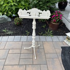 Antique wooden with metal base close hanger