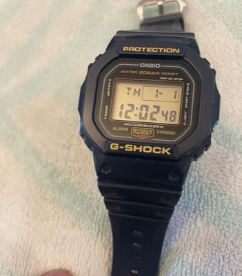 Casio G-SHOCK DW-5600RB. Blue with gold display.