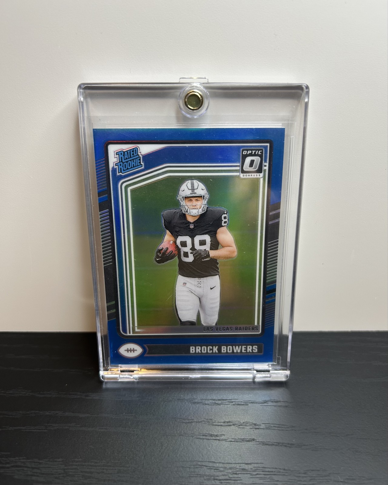 2024 Panini Donruss Optic - Rated Rookie Brock Bowers #215 Aqua Prizm /299 (RC)
