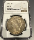 AU58 1923 Peace Silver Dollar NGC - Great Golden Tone